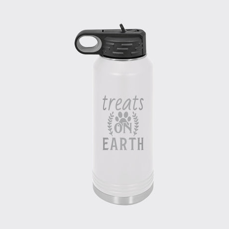 White 32 oz insulated water bottle laser engraved with "Treats on Earth"