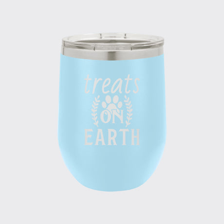 Light Blue 12 oz stemless wine tumbler laser engraved with "Treats on Earth"