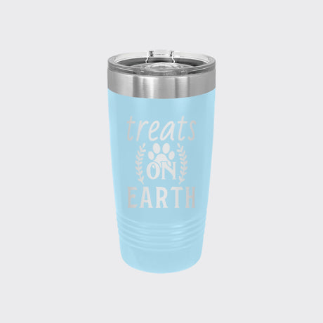 Light Blue 20 oz tumbler laser engraved with "Treats on Earth"