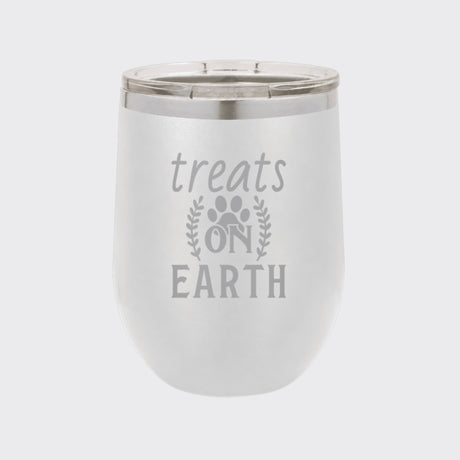 White 12 oz stemless wine tumbler laser engraved with "Treats on Earth"