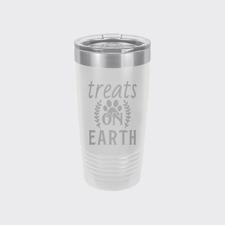White 20 oz tumbler laser engraved with "Treats on Earth"