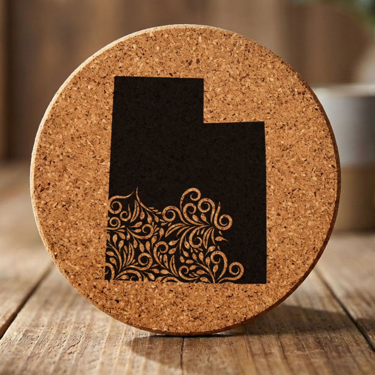 Utah round cork coaster engraved with the state shape in ornate floral scrollwork