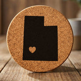 Utah round cork coaster engraved with the state shape and a heart