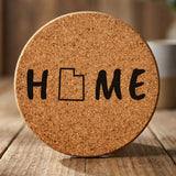 Utah round cork coaster engraved with HOME using the state outline as the letter O