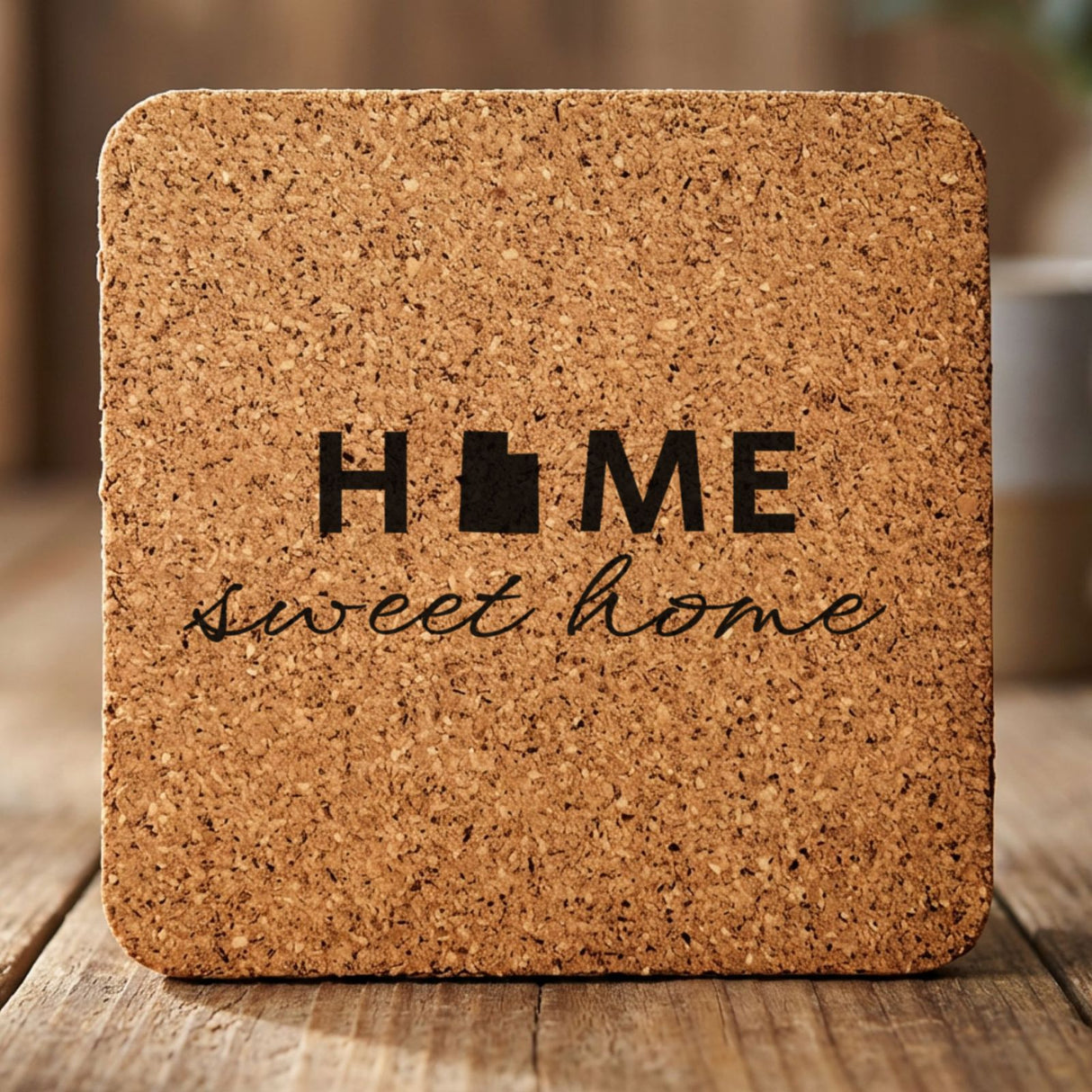 Utah square cork coaster engraved with HOME sweet home using the state shape as the letter O