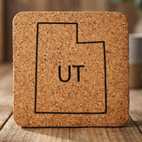 Utah square cork coaster engraved with the state outline and UT initials