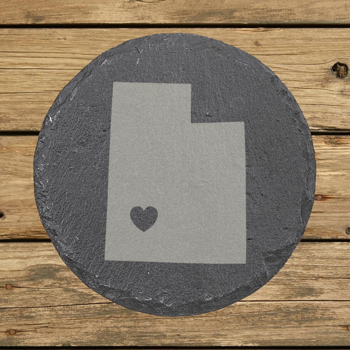 Utah round slate coaster engraved with the state shape and a heart