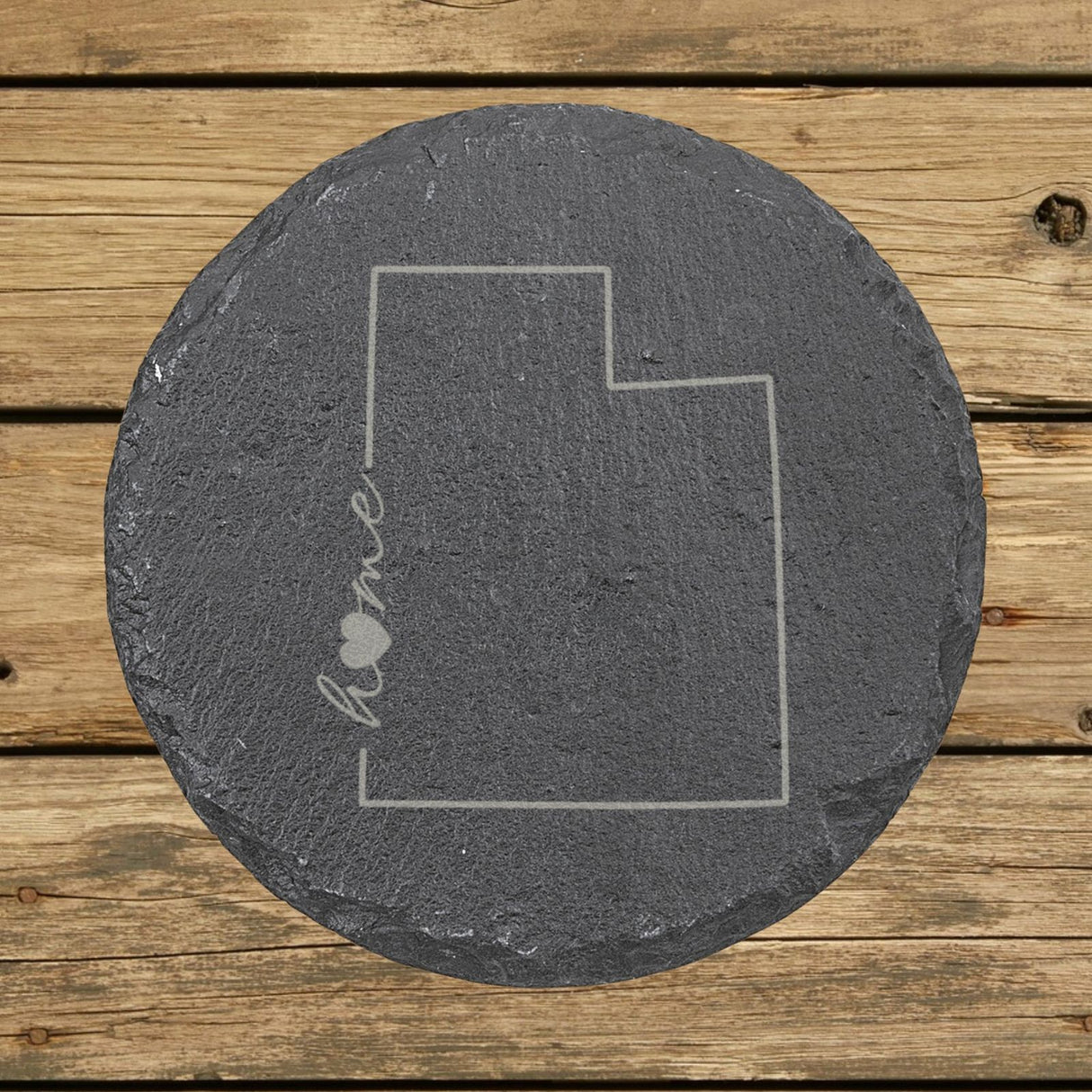 Utah round slate coaster engraved with the state outline and home in script with a heart