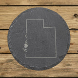 Utah round slate coaster engraved with the state outline and home in script with a heart