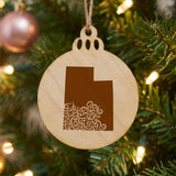 Utah round wood Christmas ornament engraved with the state shape in ornate floral scrollwork