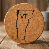 Vermont round cork coaster engraved with the state outline and VT initials