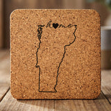 Vermont square cork coaster engraved with the state outline and home in script with a heart