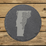 Vermont round slate coaster engraved with the state shape in ornate floral scrollwork