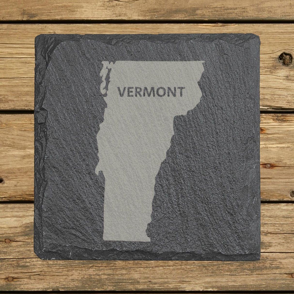 Vermont square slate coaster engraved with the state shape and VERMONT in bold lettering
