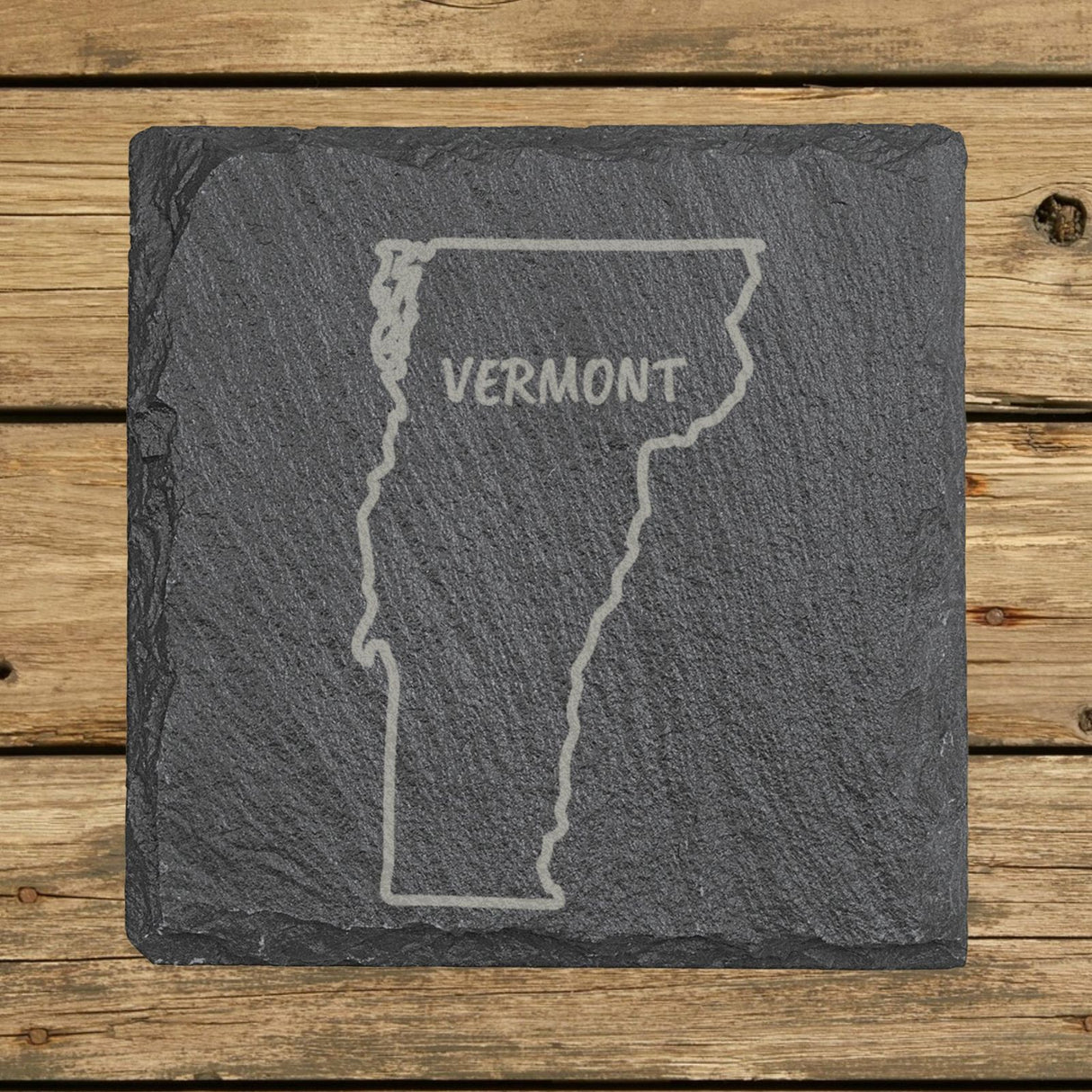 Vermont square slate coaster engraved with the state outline and VERMONT in hand-drawn brush lettering