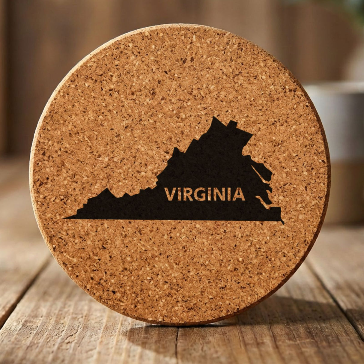Virginia round cork coaster engraved with the state shape and VIRGINIA in bold lettering