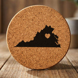 Virginia round cork coaster engraved with the state shape and a heart