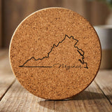 Virginia round cork coaster engraved with the state outline and Virginia in script lettering