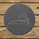 Virginia round slate coaster engraved with the state outline and VIRGINIA in hand-drawn brush lettering