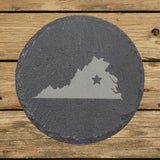 Virginia round slate coaster engraved with the state shape and a star