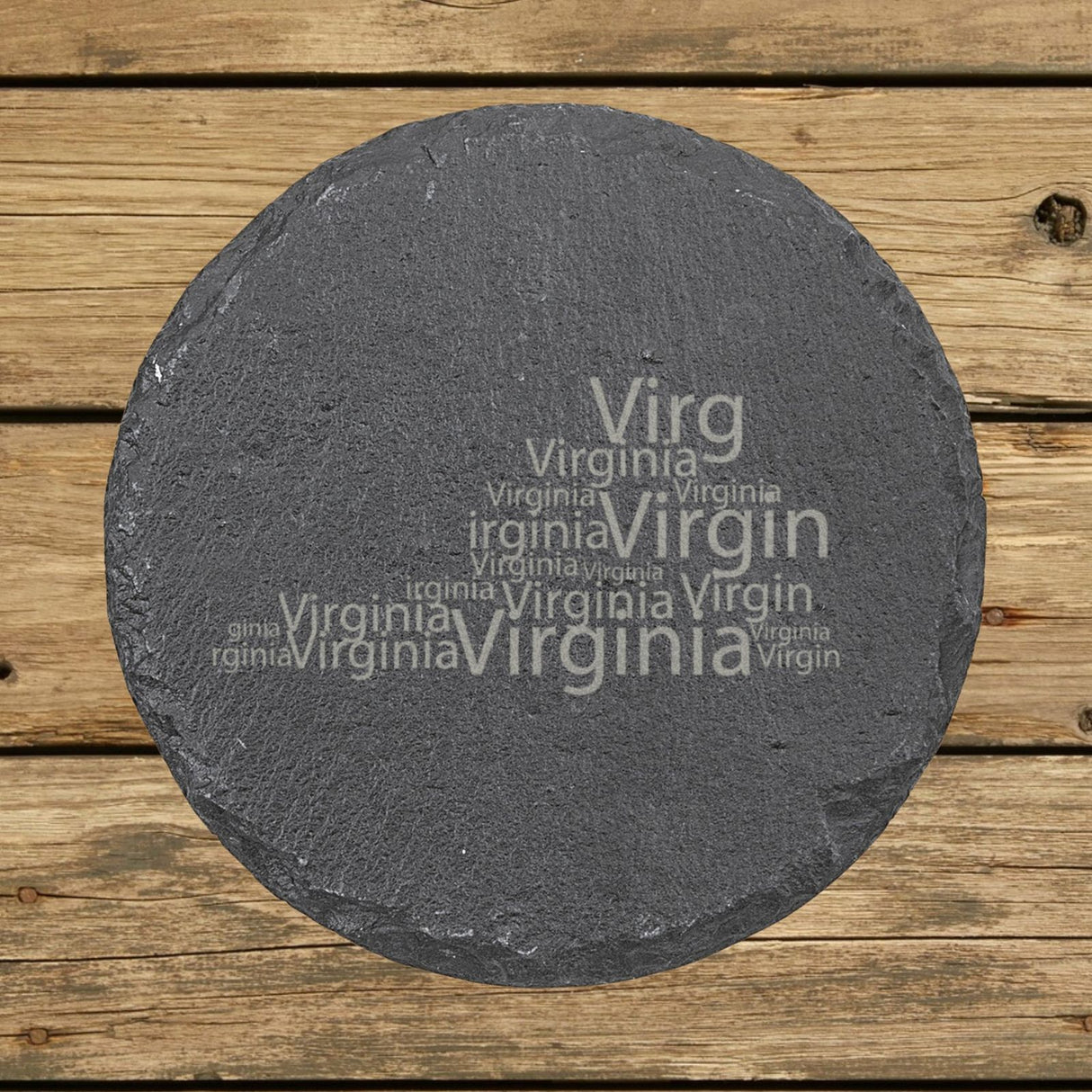Virginia round slate coaster engraved with a word cloud of repeating Virginia text