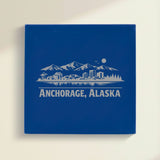 Close up of the Anchorage, Alaska skyline engraved on Blue leatherette
