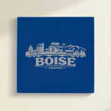Close up of the Boise, Idaho skyline engraved on Blue leatherette