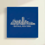 Close up of the Buffalo, New York skyline engraved on Blue leatherette
