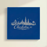 Close up of the Charleston, South Carolina skyline engraved on Blue leatherette