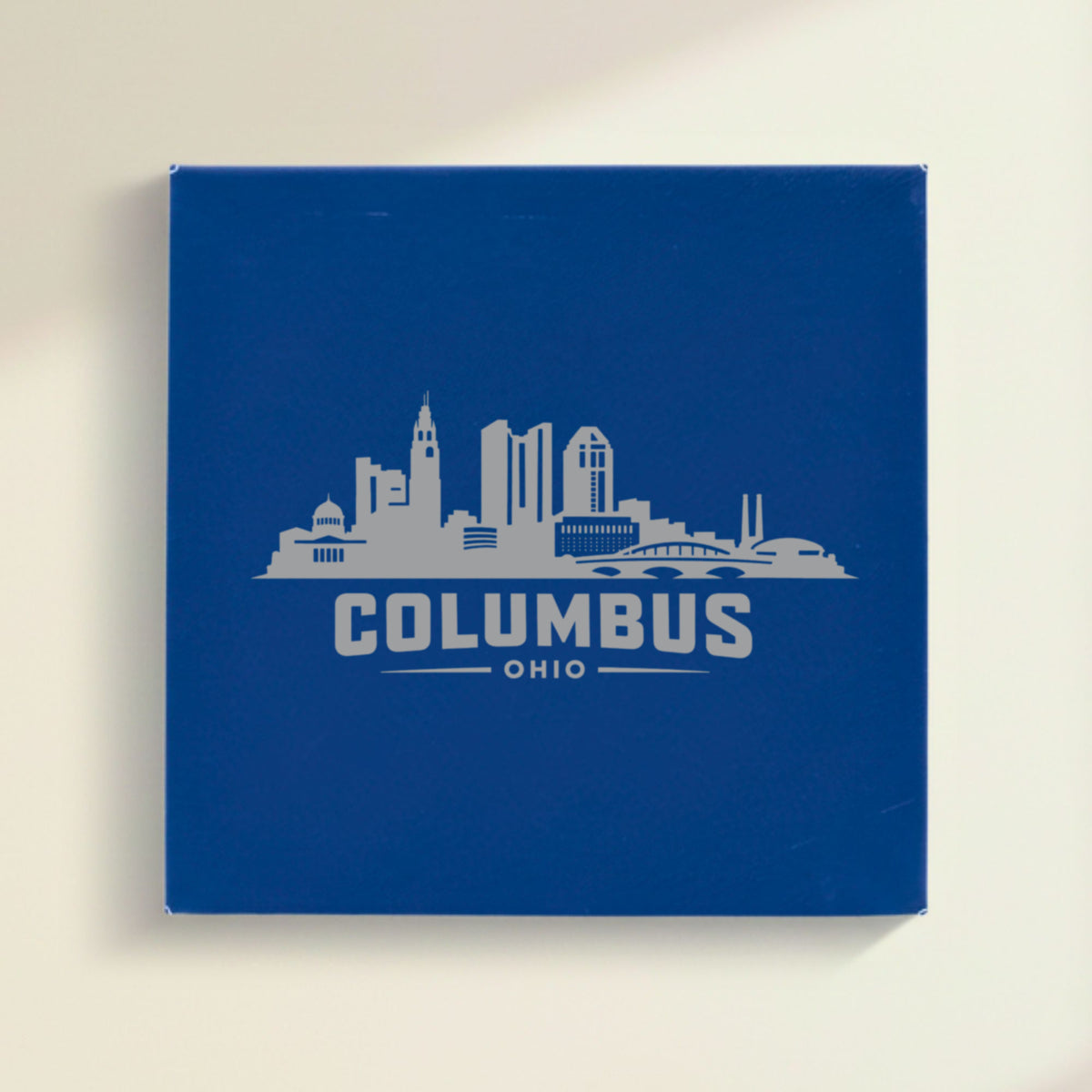 Close up of the Columbus, Ohio skyline engraved on Blue leatherette