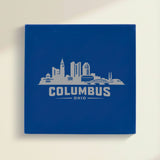 Close up of the Columbus, Ohio skyline engraved on Blue leatherette