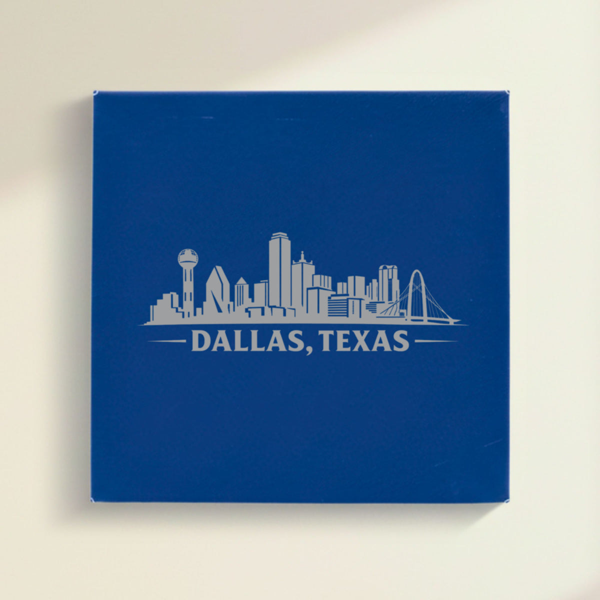 Close up of the Dallas, Texas skyline engraved on Blue leatherette