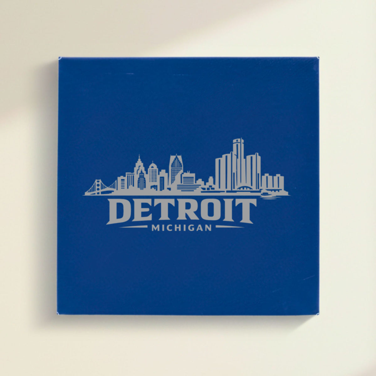 Close up of the Detroit, Michigan skyline engraved on Blue leatherette
