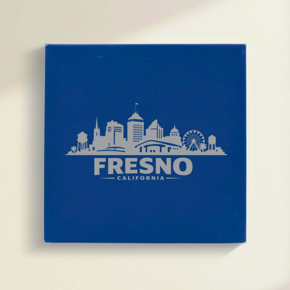 Close up of the Fresno, California skyline engraved on Blue leatherette