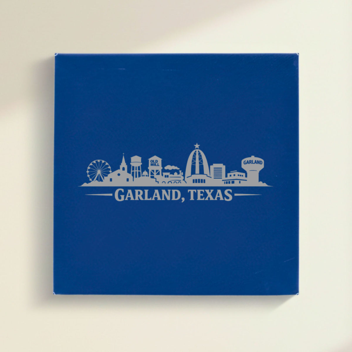 Close up of the Garland, Texas skyline engraved on Blue leatherette
