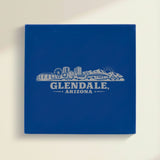 Close up of the Glendale, Arizona skyline engraved on Blue leatherette