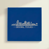 Close up of the Irving, Texas skyline engraved on Blue leatherette
