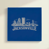 Close up of the Jacksonville, Florida skyline engraved on Blue leatherette
