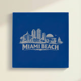 Close up of the Miami Beach, Florida skyline engraved on Blue leatherette