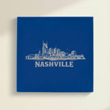Close up of the Nashville, Tennessee skyline engraved on Blue leatherette