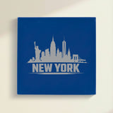 Close up of the New York, New York skyline engraved on Blue leatherette