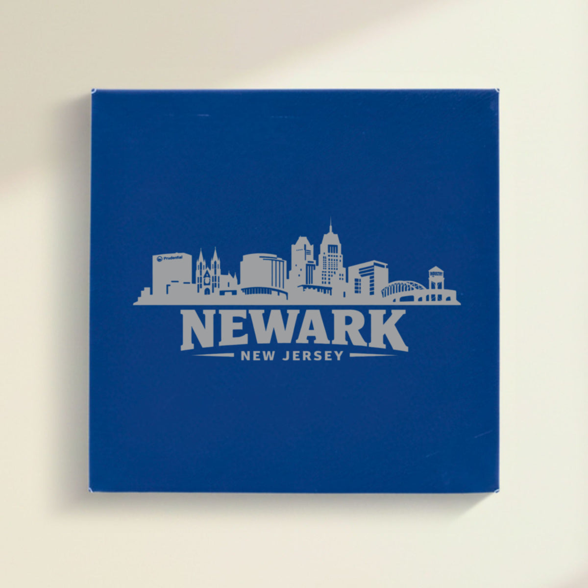 Close up of the Newark, New Jersey skyline engraved on Blue leatherette