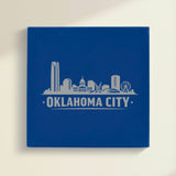 Close up of the Oklahoma City, Oklahoma skyline engraved on Blue leatherette