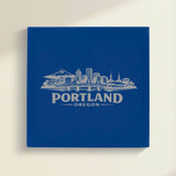 Close up of the Portland, Oregon skyline engraved on Blue leatherette