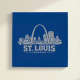 Close up of the St. Louis, Missouri skyline engraved on Blue leatherette