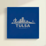 Close up of the Tulsa, Oklahoma skyline engraved on Blue leatherette