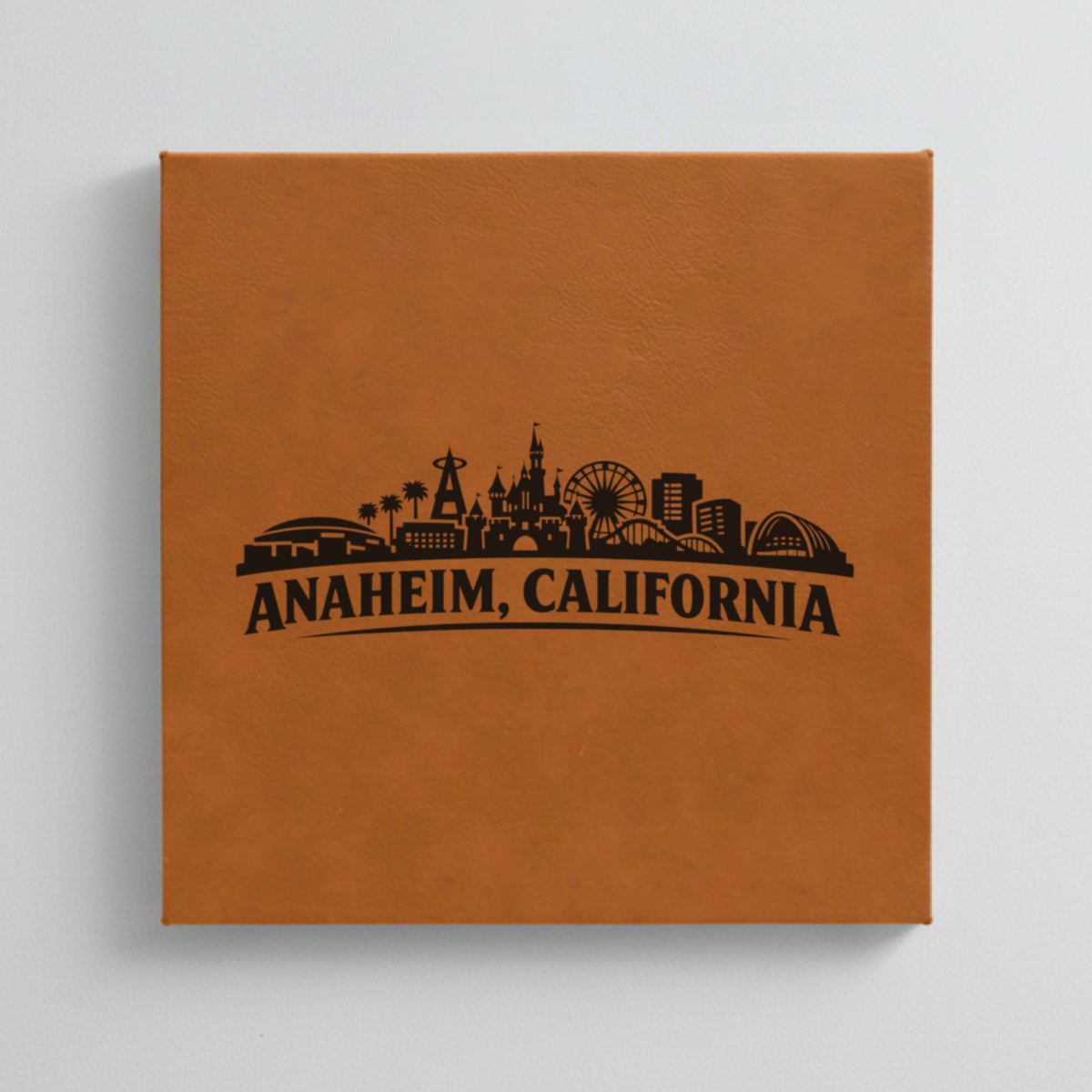 Close up of the Anaheim, California skyline engraved on Brown leatherette