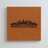 Close up of the Anaheim, California skyline engraved on Brown leatherette