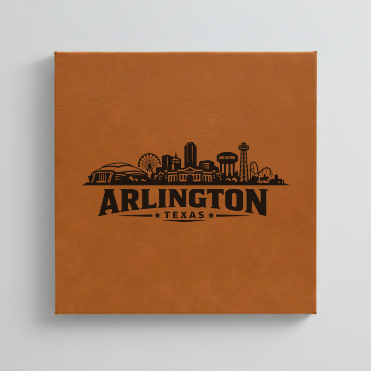 Close up of the Arlington, Texas skyline engraved on Brown leatherette