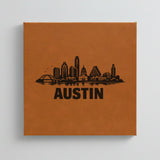 Close up of the Austin, Texas skyline engraved on Brown leatherette